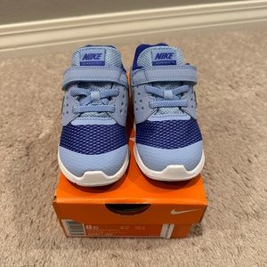 Nike downshifter 7. toddler girls size 8. Brand new in box.